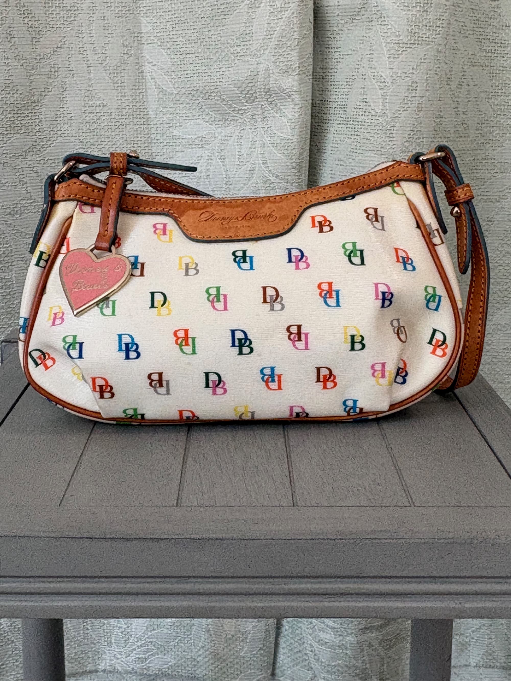 Dooney & Bourke "It Girl" Multicolor Monogram Patty Baguette Pouchette — Y2K Vintage | Heart Charm